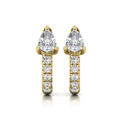 Pear cut lab grown diamond huggie hoop earrings featuring a three prong basket set center diamond with round brilliant pavé diamonds on a yellow gold hinged hoop.