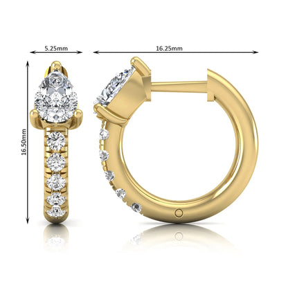 Pear cut lab grown diamond huggie hoop earrings featuring a three prong basket set center diamond with round brilliant pavé diamonds on a yellow gold hinged hoop.