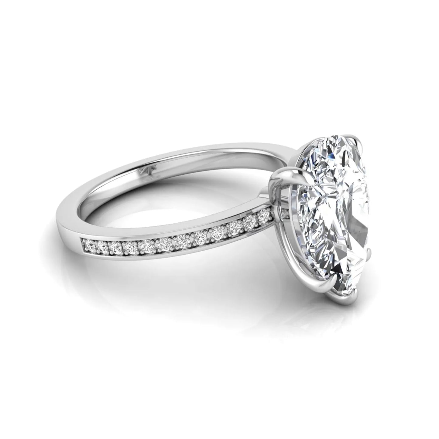 Pear cut lab grown diamond solitaire engagement ring featuring a five-prong setting with a pavé diamond band in white gold tone.