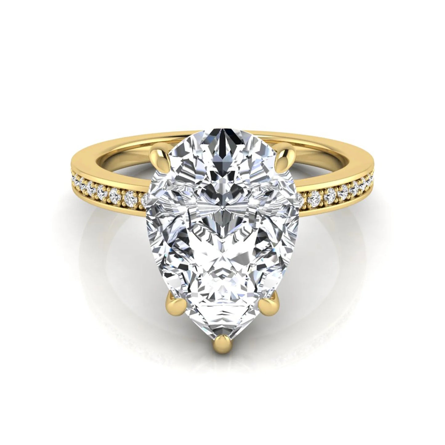 Pear cut lab grown diamond solitaire engagement ring featuring a five-prong setting with a pavé diamond band in yellow gold tone.