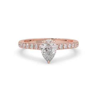 pear cut lab grown diamond prong set engagement ring with pavé band and rose gold  metal tone design