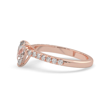 pear cut lab grown diamond prong set engagement ring with pavé band and rose gold  metal tone design