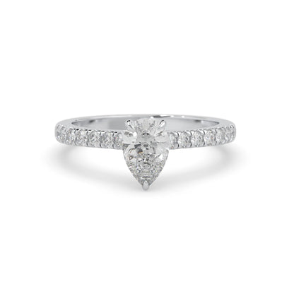 pear cut lab grown diamond prong set engagement ring with pavé band and white gold  metal tone design