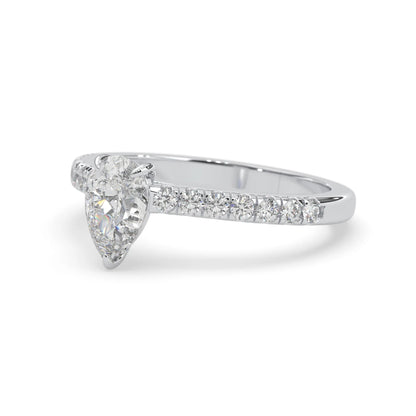 pear cut lab grown diamond prong set engagement ring with pavé band and white gold  metal tone design