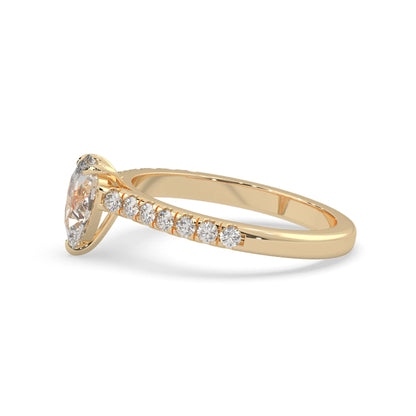 pear cut lab grown diamond prong set engagement ring with pavé band and yellow gold  metal tone design