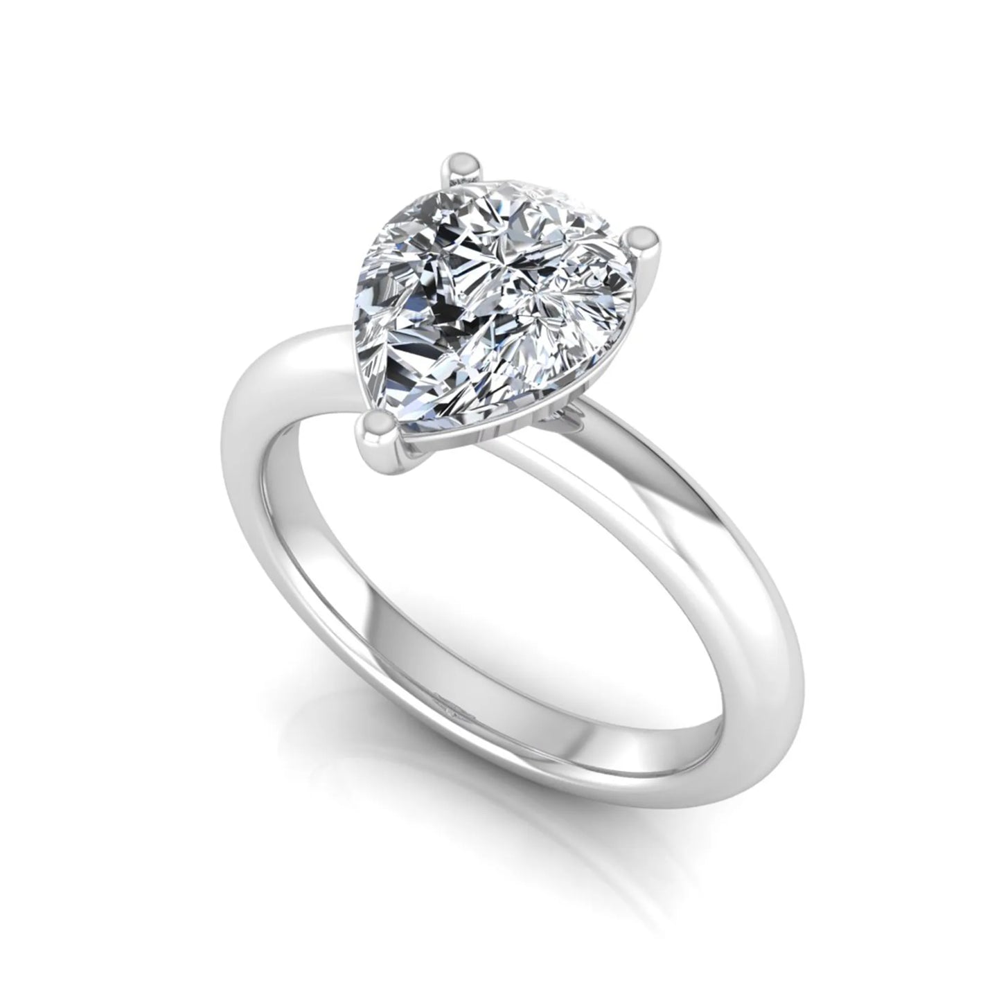Pear cut lab grown diamond solitaire engagement ring featuring a classic three-prong setting with a polished white gold tapered band.