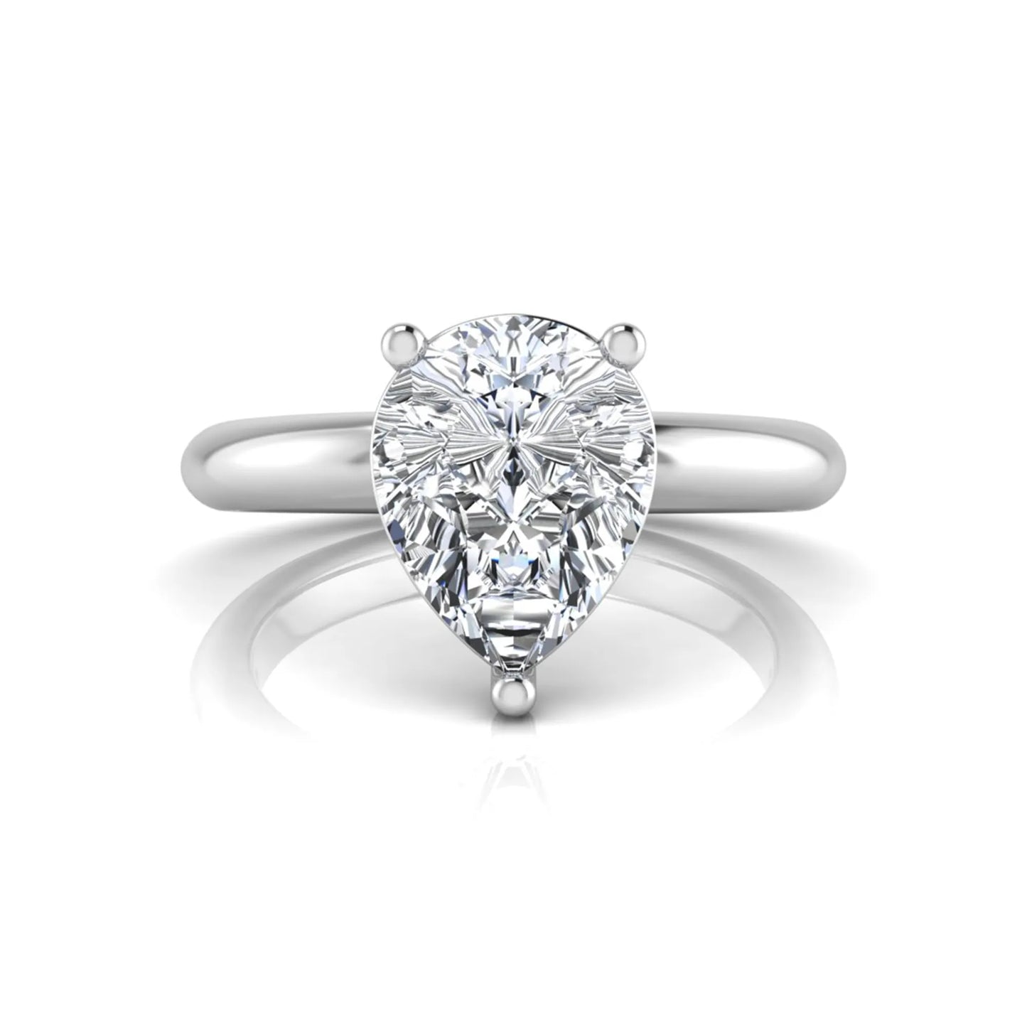 Pear cut lab grown diamond solitaire engagement ring featuring a classic three-prong setting with a polished white gold tapered band.