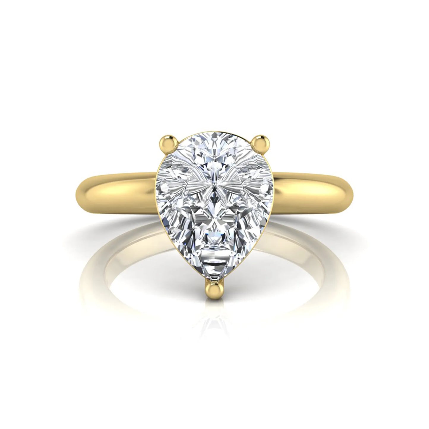 Pear cut lab grown diamond solitaire engagement ring featuring a classic three-prong setting with a polished yellow gold tapered band.