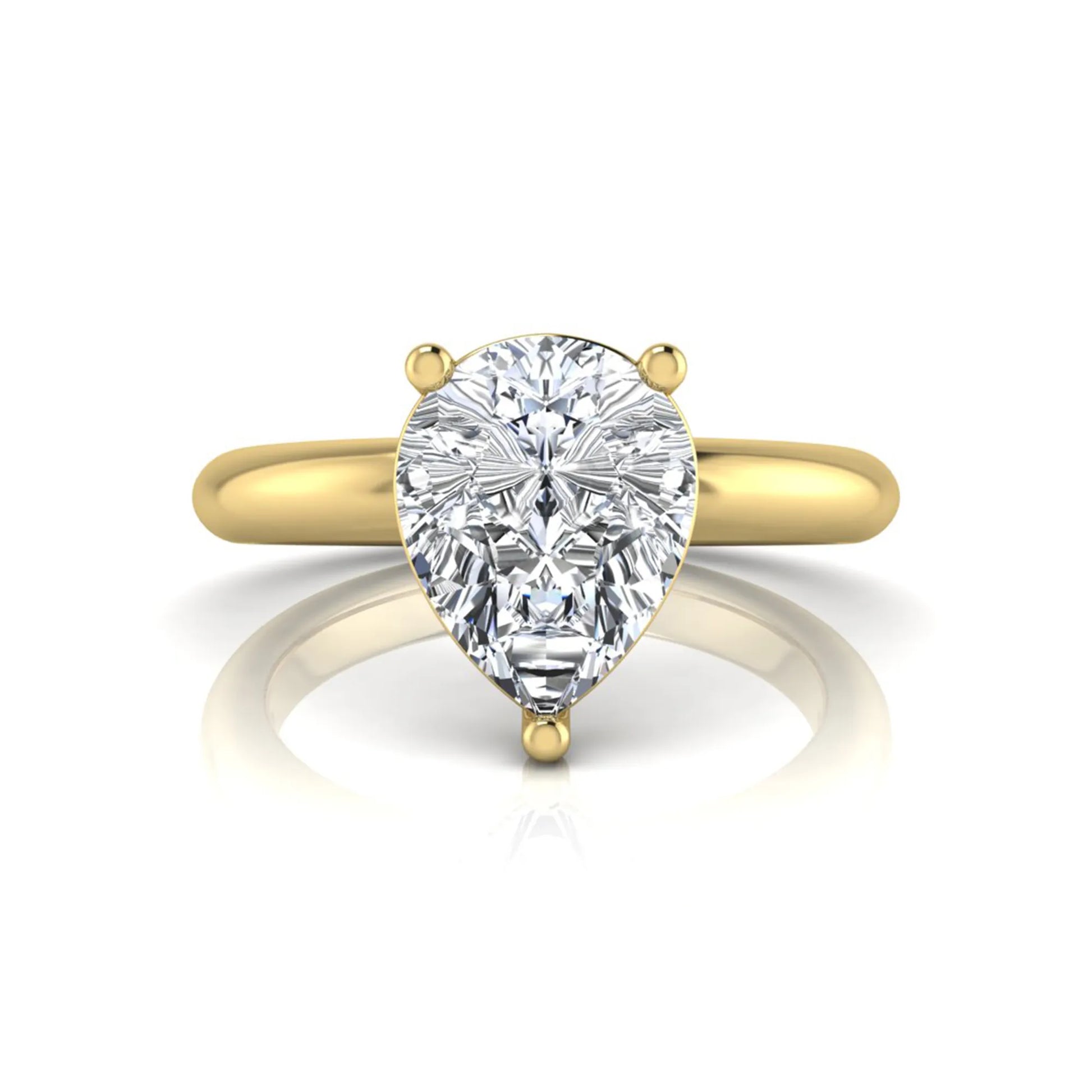 Pear cut lab grown diamond solitaire engagement ring featuring a classic three-prong setting with a polished yellow gold tapered band.
