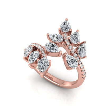 Pear and round cut lab grown diamond floral bypass ring featuring leaf-inspired clusters with pavé diamond accents in rose gold