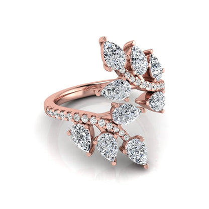 Pear and round cut lab grown diamond floral bypass ring featuring leaf-inspired clusters with pavé diamond accents in rose gold