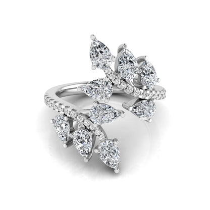 Pear and round cut lab grown diamond floral bypass ring featuring leaf-inspired clusters with pavé diamond accents in white gold