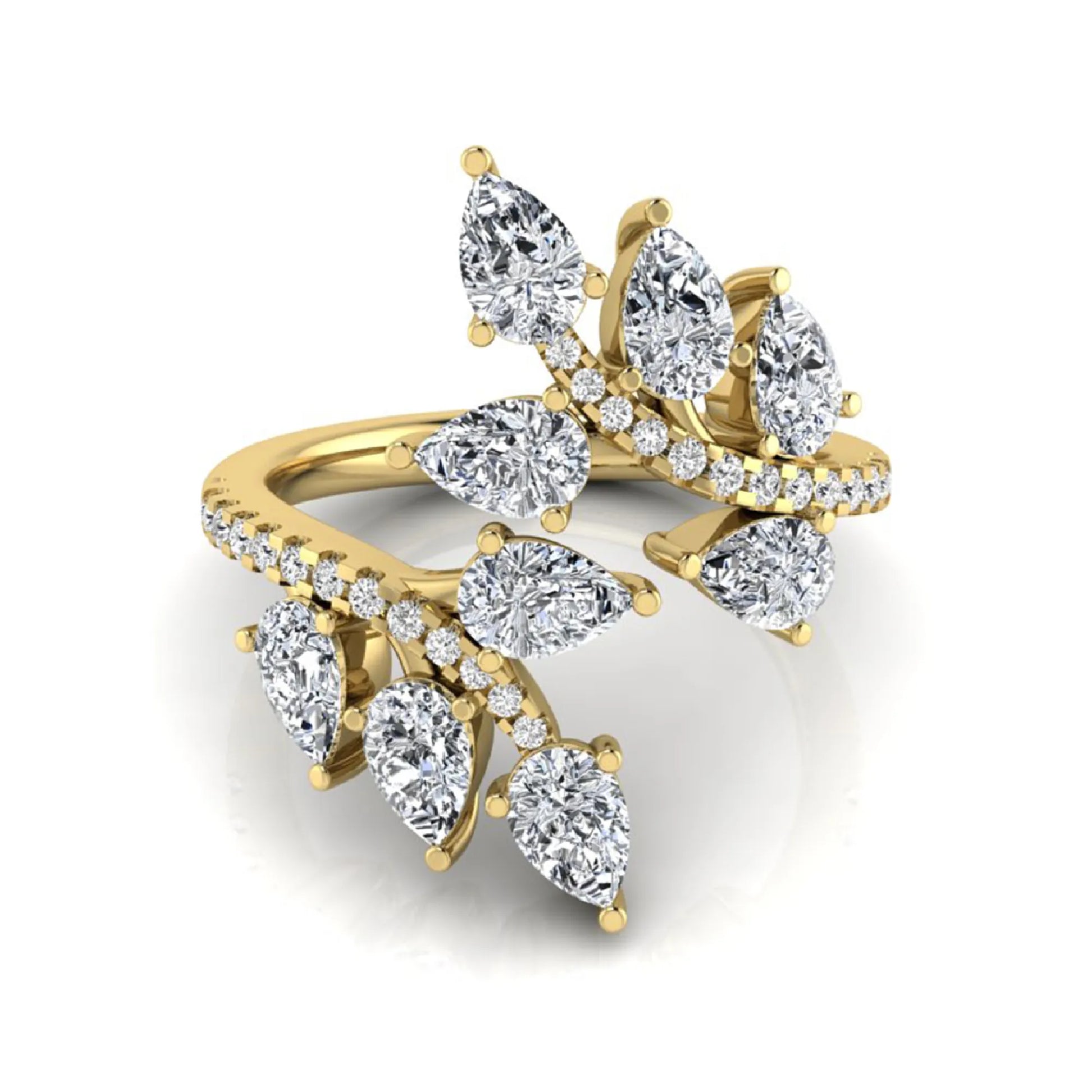 Pear and round cut lab grown diamond floral bypass ring featuring leaf-inspired clusters with pavé diamond accents in yellow gold
