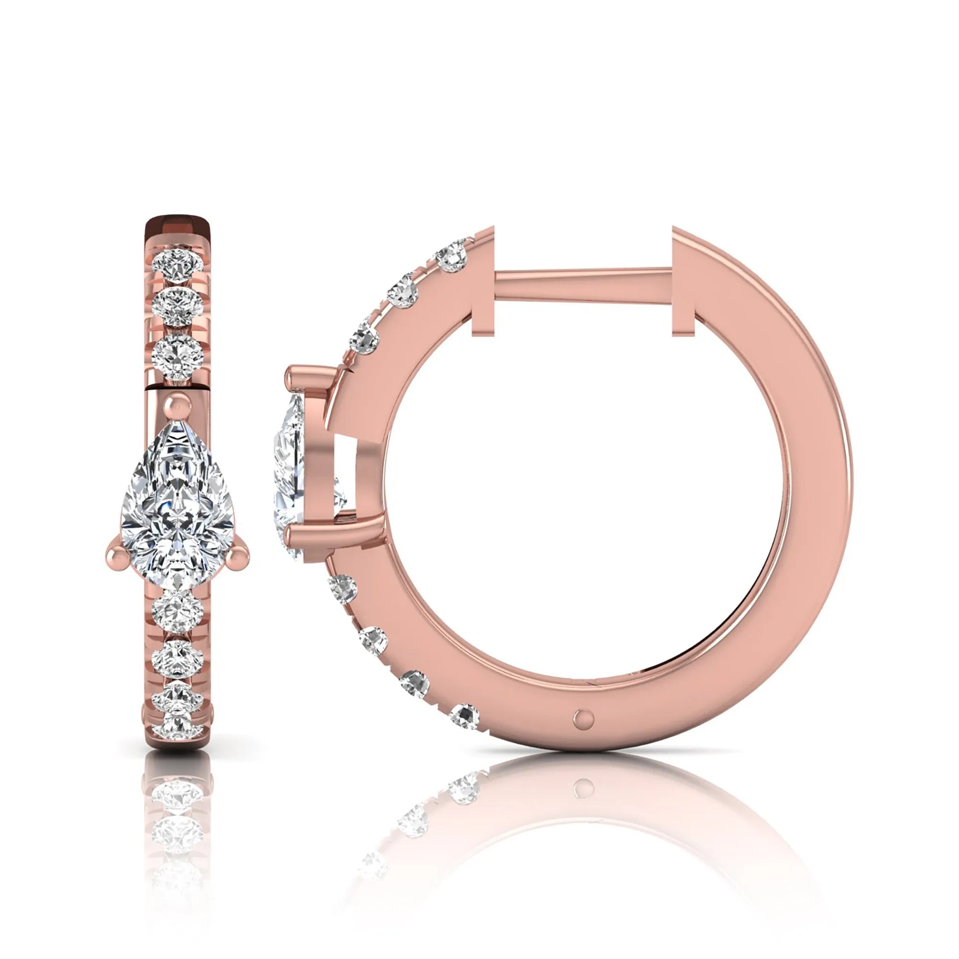 Pear and round cut lab grown diamond pavé huggie hoop earrings featuring a three prong pear diamond center, shared prong round diamond accents, hinged snap closure, and polished rose gold finish.