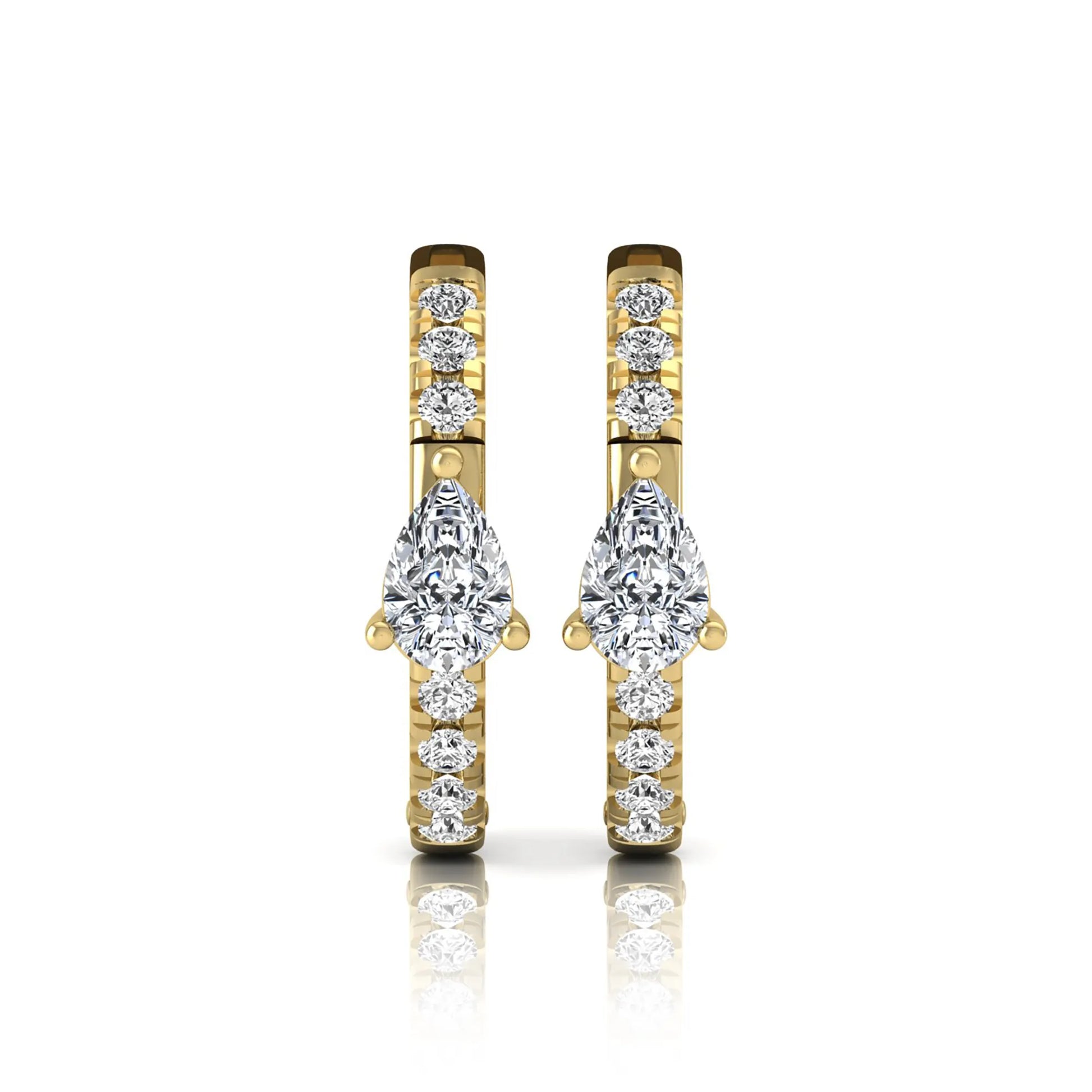 Pear and round cut lab grown diamond pavé huggie hoop earrings featuring a three prong pear diamond center, shared prong round diamond accents, hinged snap closure, and polished yellow gold finish.