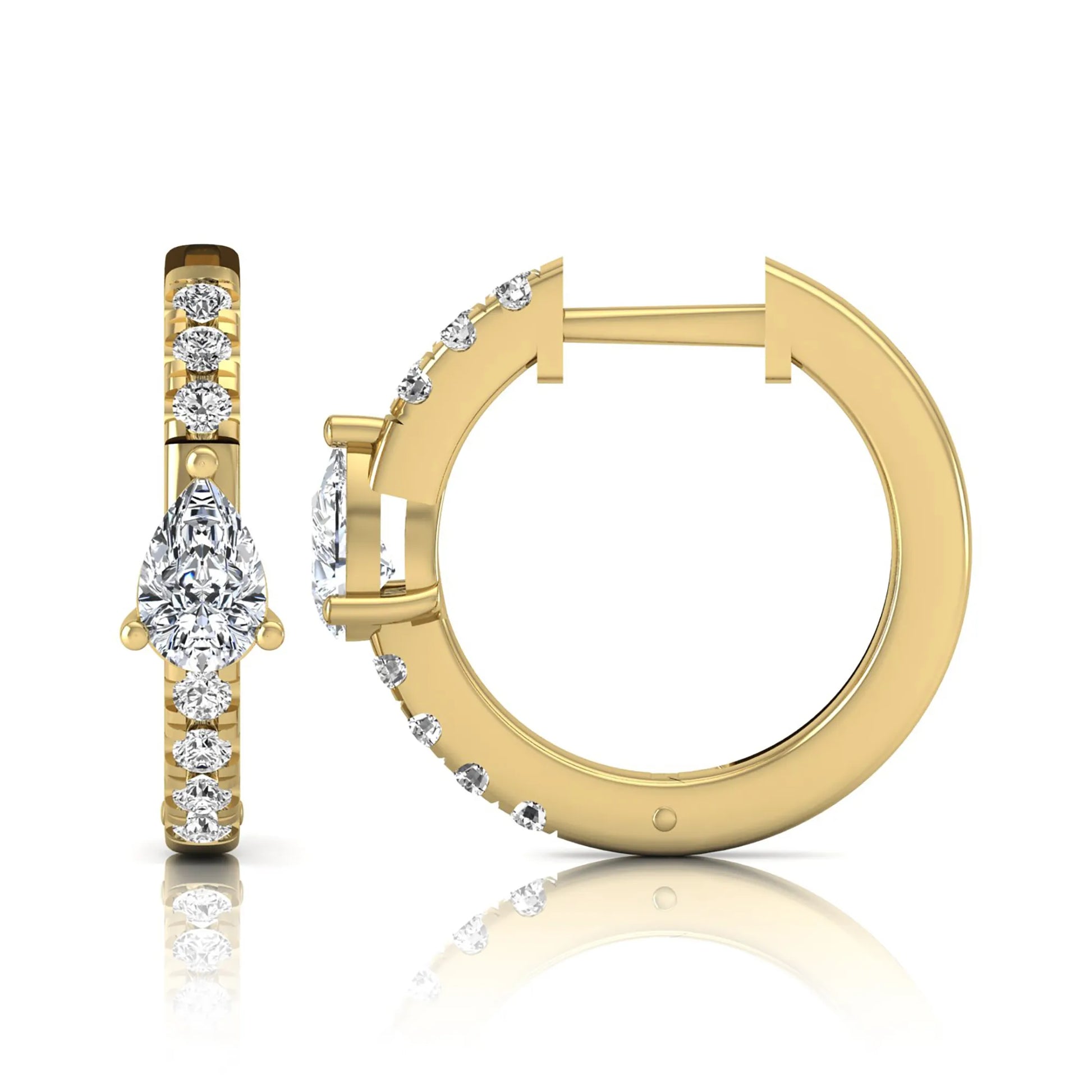Pear and round cut lab grown diamond pavé huggie hoop earrings featuring a three prong pear diamond center, shared prong round diamond accents, hinged snap closure, and polished yellow gold finish.