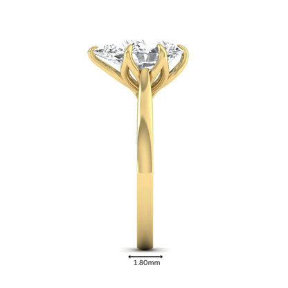 IGI Certified 3.00 carat pear cut lab grown diamond solitaire engagement ring in yellow gold.