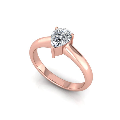 Pear cut solitaire lab grown diamond engagement ring with a polished rose gold comfort-fit band.