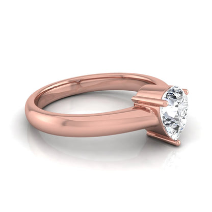 Pear cut solitaire lab grown diamond engagement ring with a polished rose gold comfort-fit band.