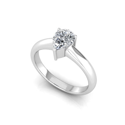 Pear cut solitaire lab grown diamond engagement ring with a polished white gold comfort-fit band.