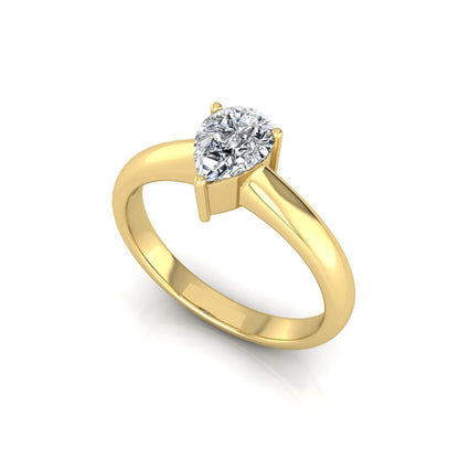 Pear cut solitaire lab grown diamond engagement ring with a polished yellow gold comfort-fit band.