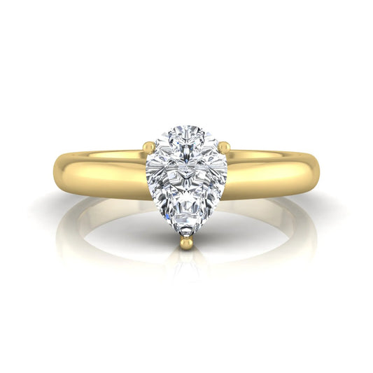 Pear cut solitaire lab grown diamond engagement ring with a polished yellow gold comfort-fit band.