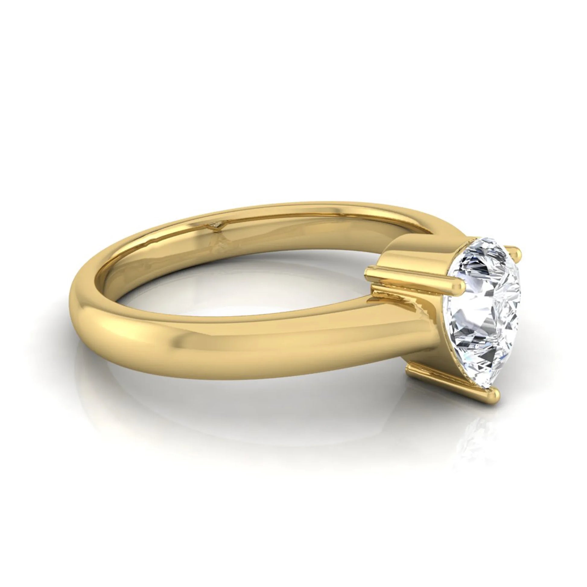 Pear cut solitaire lab grown diamond engagement ring with a polished yellow gold comfort-fit band.