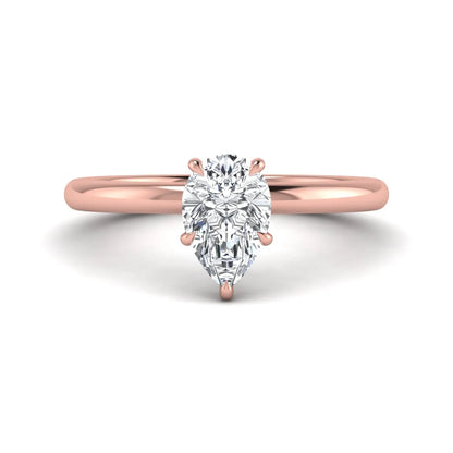 Pear cut lab grown diamond solitaire engagement ring in a four-prong rose gold setting
