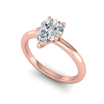 Pear cut lab grown diamond solitaire engagement ring in a four-prong rose gold setting