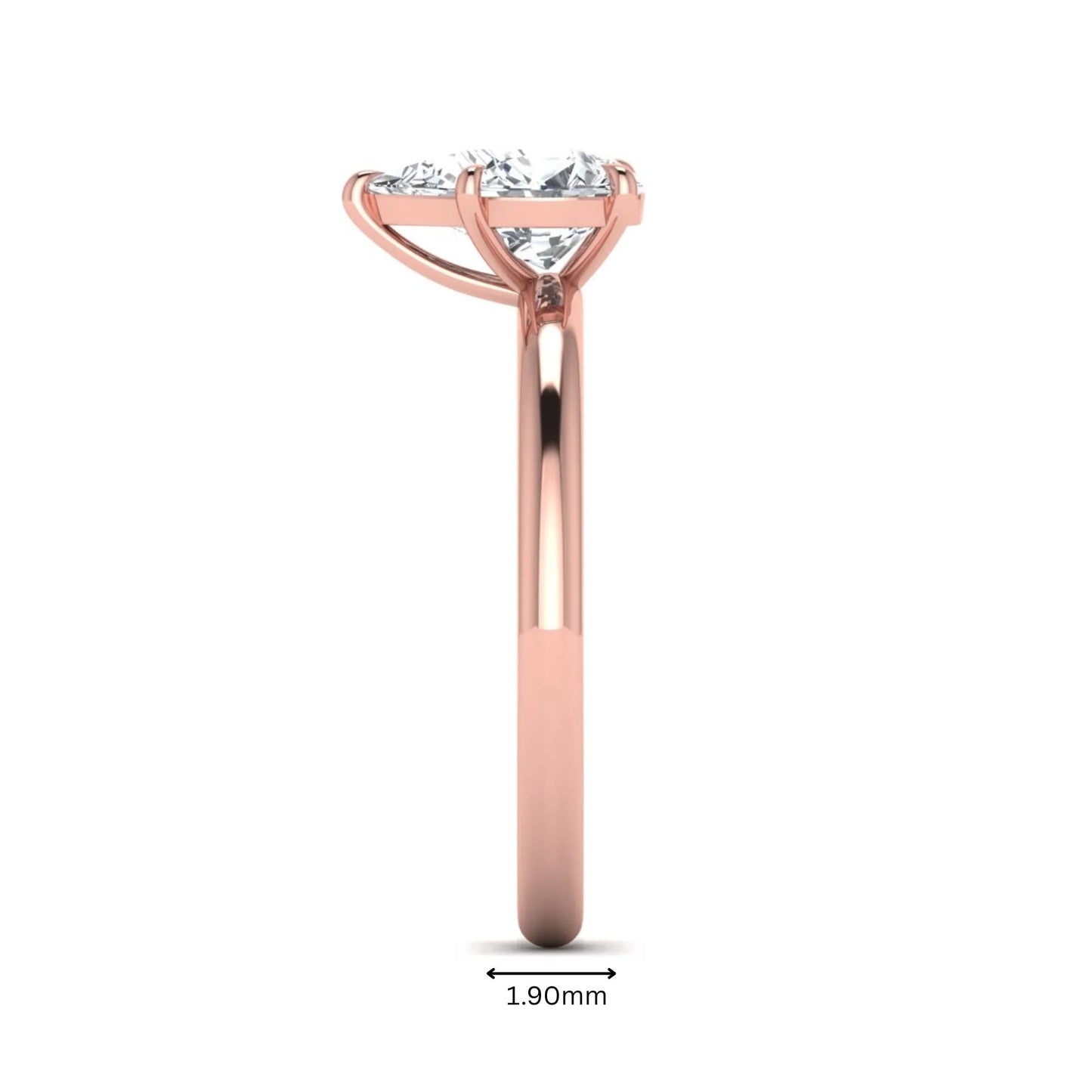 Pear cut lab grown diamond solitaire engagement ring in a four-prong rose gold setting