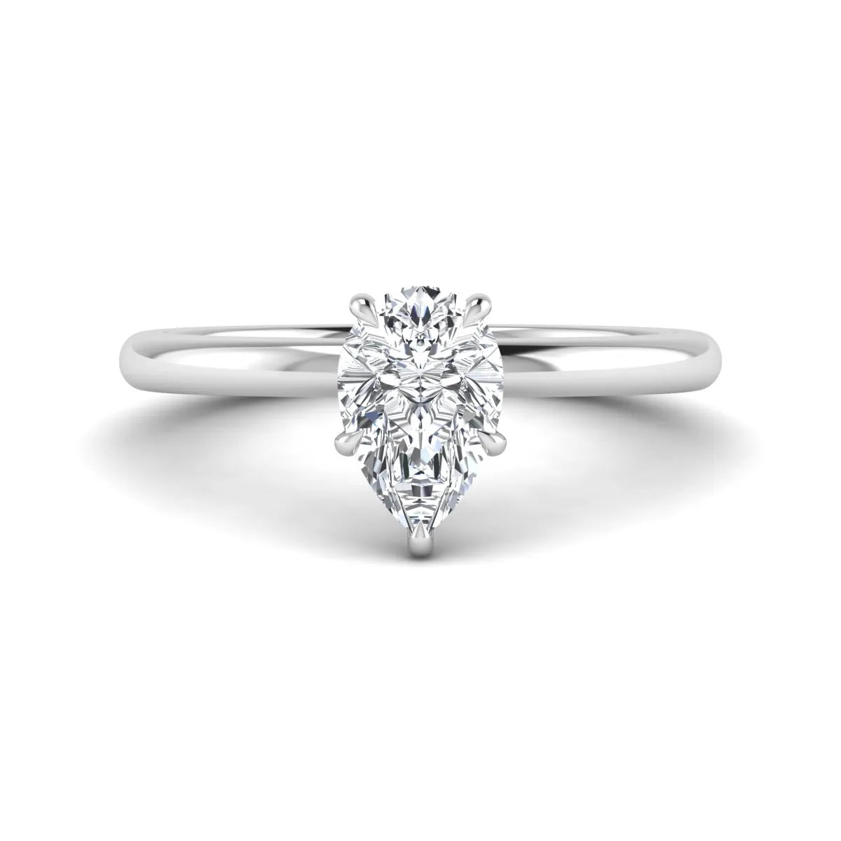 Pear cut lab grown diamond solitaire engagement ring in a four-prong white gold setting