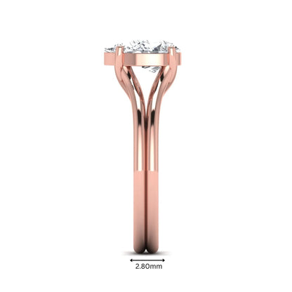IGI certified 1.34 carat pear cut lab grown diamond solitaire engagement ring with elegant split shank in rose gold.
