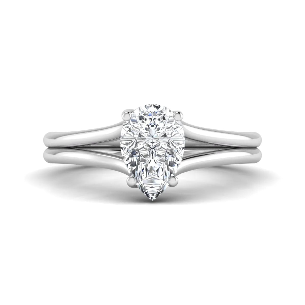 IGI certified 1.34 carat pear cut lab grown diamond solitaire engagement ring with elegant split shank in white gold.