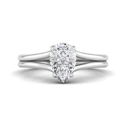 IGI certified 1.34 carat pear cut lab grown diamond solitaire engagement ring with elegant split shank in white gold.