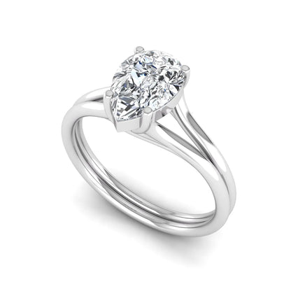IGI certified 1.34 carat pear cut lab grown diamond solitaire engagement ring with elegant split shank in white gold.