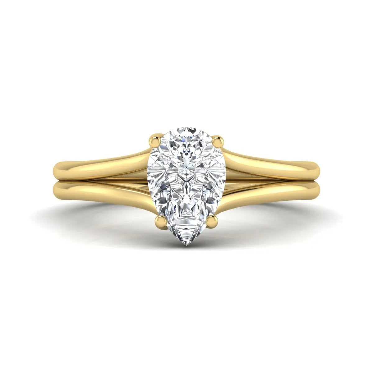 IGI certified 1.34 carat pear cut lab grown diamond solitaire engagement ring with elegant split shank in yellow gold.