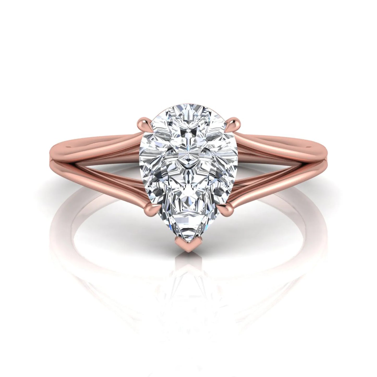 Pear cut lab grown diamond solitaire engagement ring with an elegant split shank and classic prong setting in rose gold