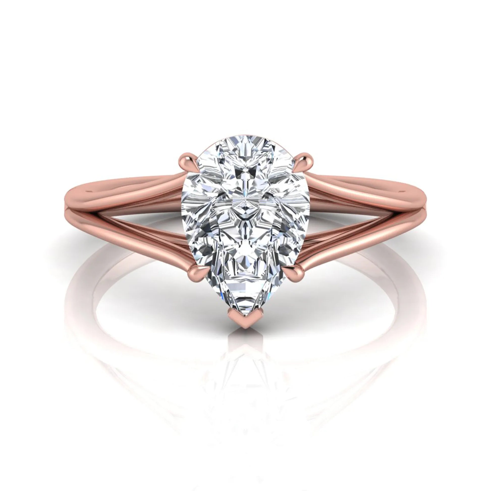 Pear cut lab grown diamond solitaire engagement ring with an elegant split shank and classic prong setting in rose gold