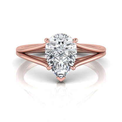 Pear cut lab grown diamond solitaire engagement ring with an elegant split shank and classic prong setting in rose gold