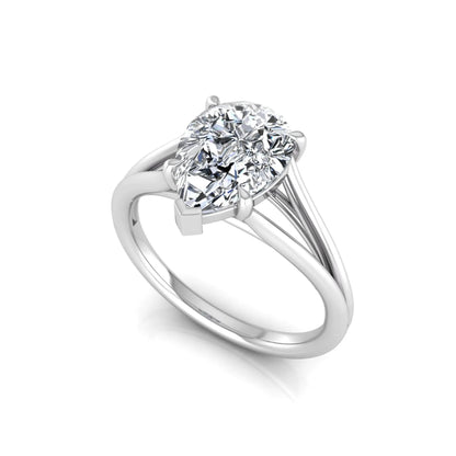 Pear cut lab grown diamond solitaire engagement ring with an elegant split shank and classic prong setting in white gold