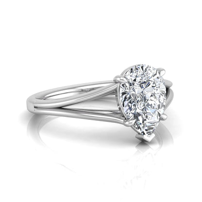 Pear cut lab grown diamond solitaire engagement ring with an elegant split shank and classic prong setting in white gold