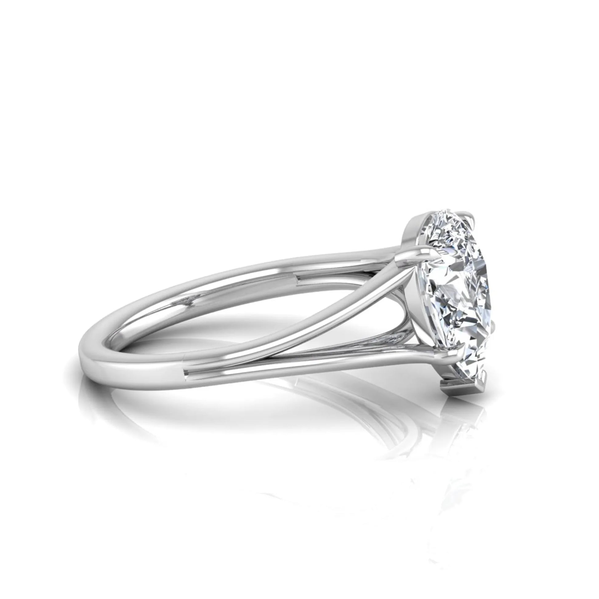 Pear cut lab grown diamond solitaire engagement ring with an elegant split shank and classic prong setting in white gold
