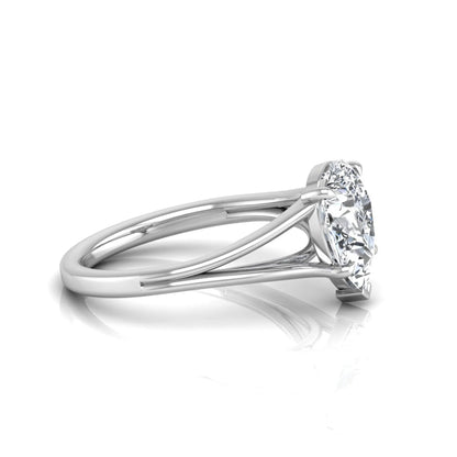 Pear cut lab grown diamond solitaire engagement ring with an elegant split shank and classic prong setting in white gold