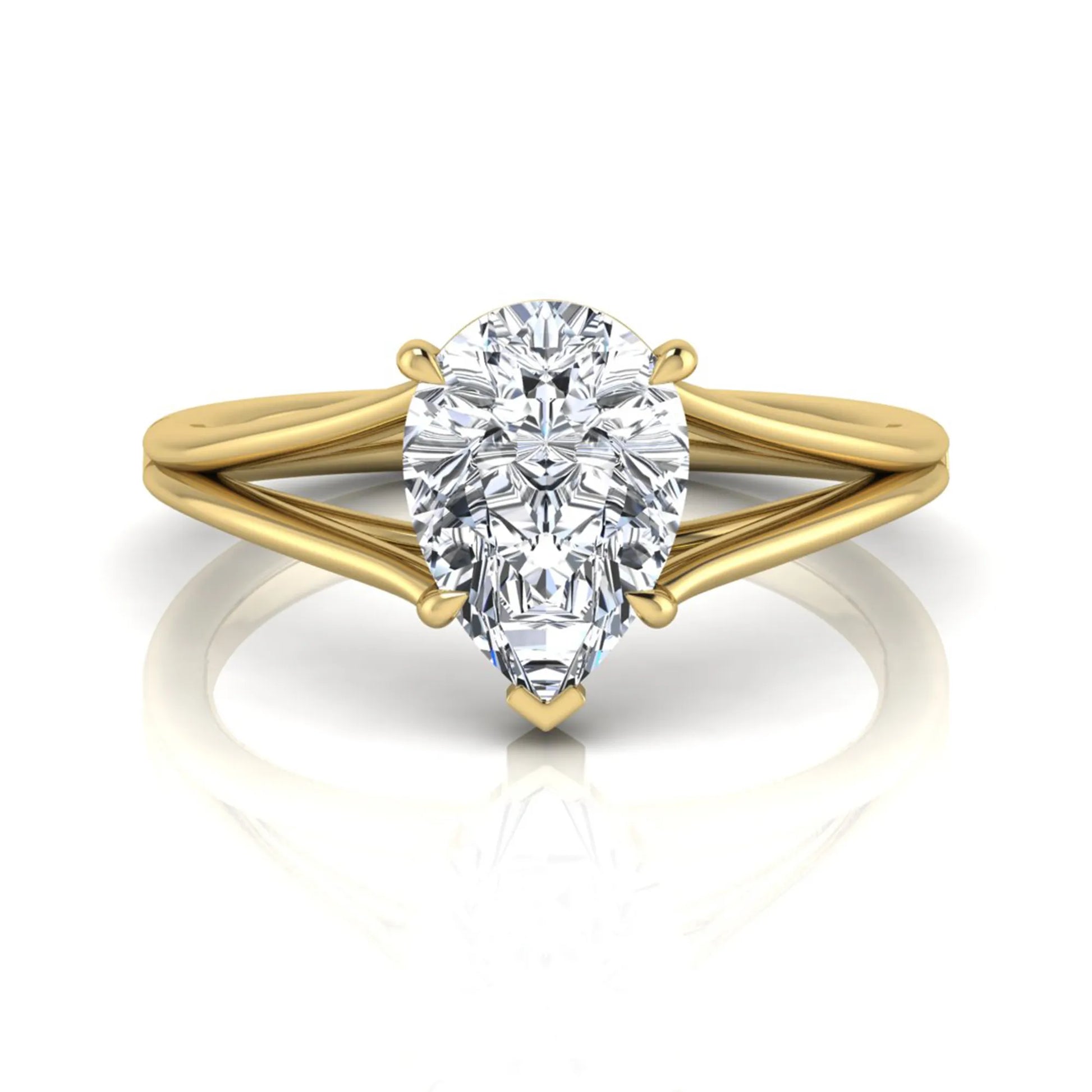 Pear cut lab grown diamond solitaire engagement ring with an elegant split shank and classic prong setting in yellow gold