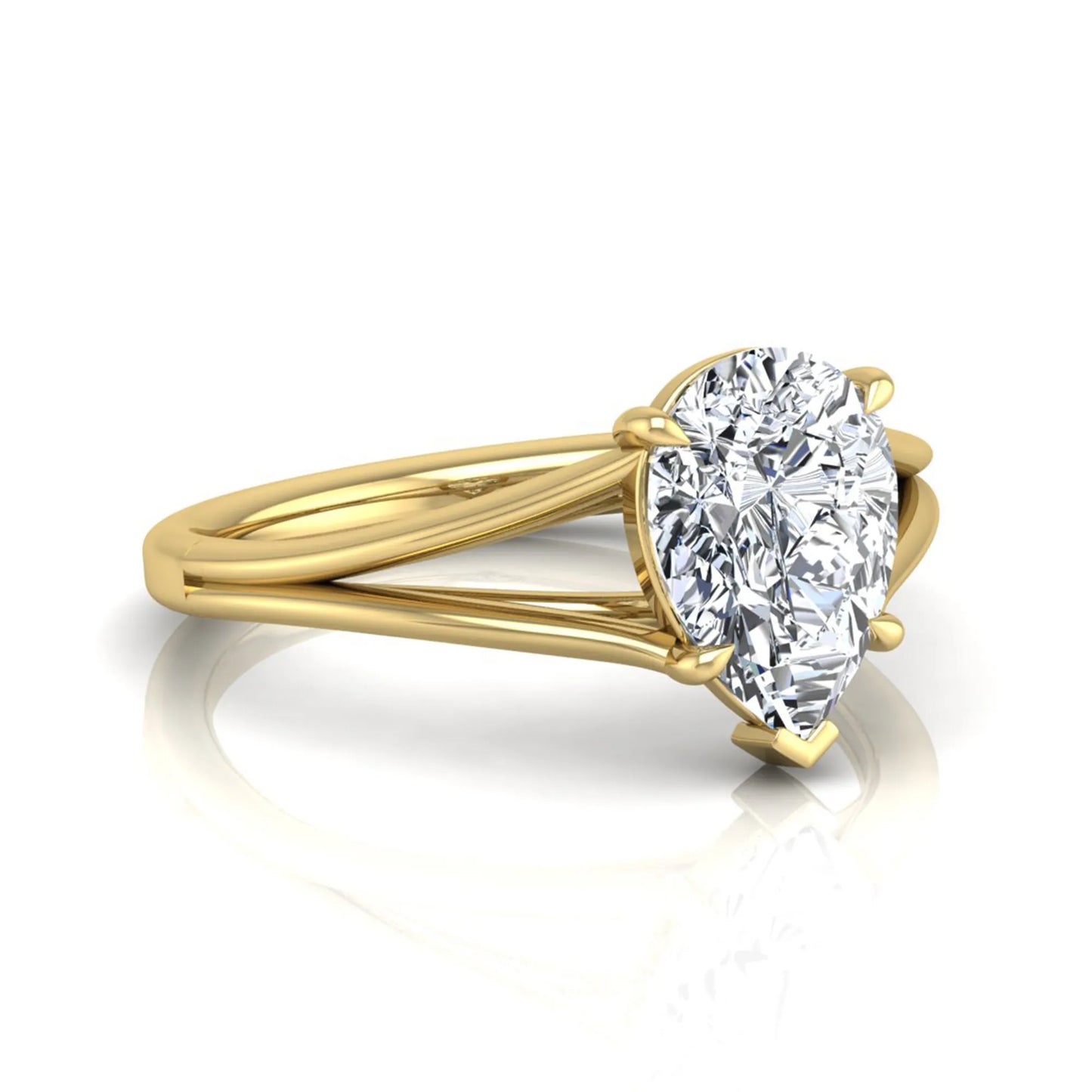 Pear cut lab grown diamond solitaire engagement ring with an elegant split shank and classic prong setting in yellow gold
