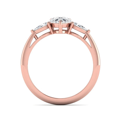Pear three stone lab grown diamond engagement ring featuring a 1.33 carat IGI certified pear cut center diamond with pear cut side diamonds in rose gold.