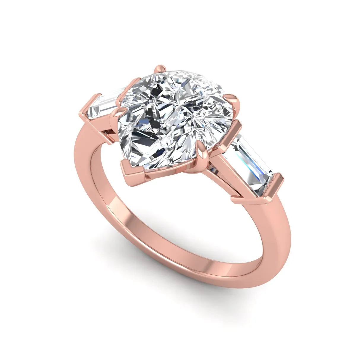 Pear cut lab grown diamond three stone engagement ring with baguette side diamonds in a classic prong setting in rose gold