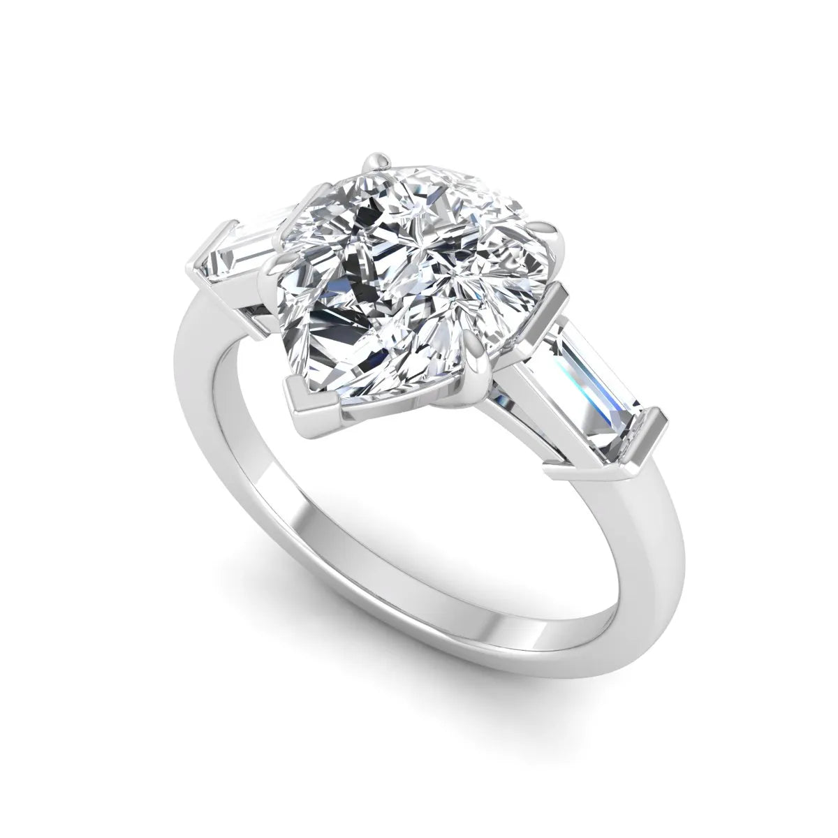 Pear cut lab grown diamond three stone engagement ring with baguette side diamonds in a classic prong setting in white gold