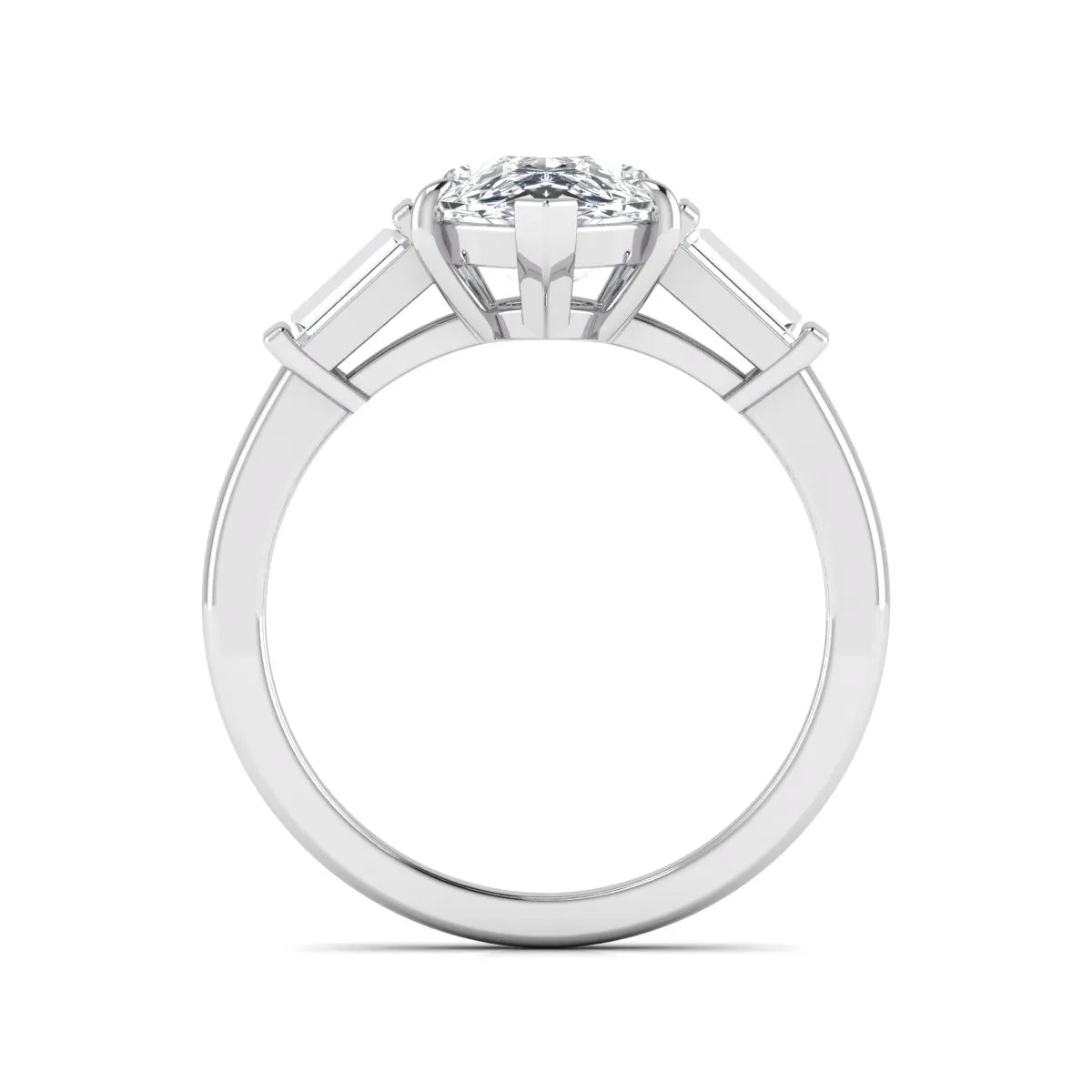Pear cut lab grown diamond three stone engagement ring with baguette side diamonds in a classic prong setting in white gold
