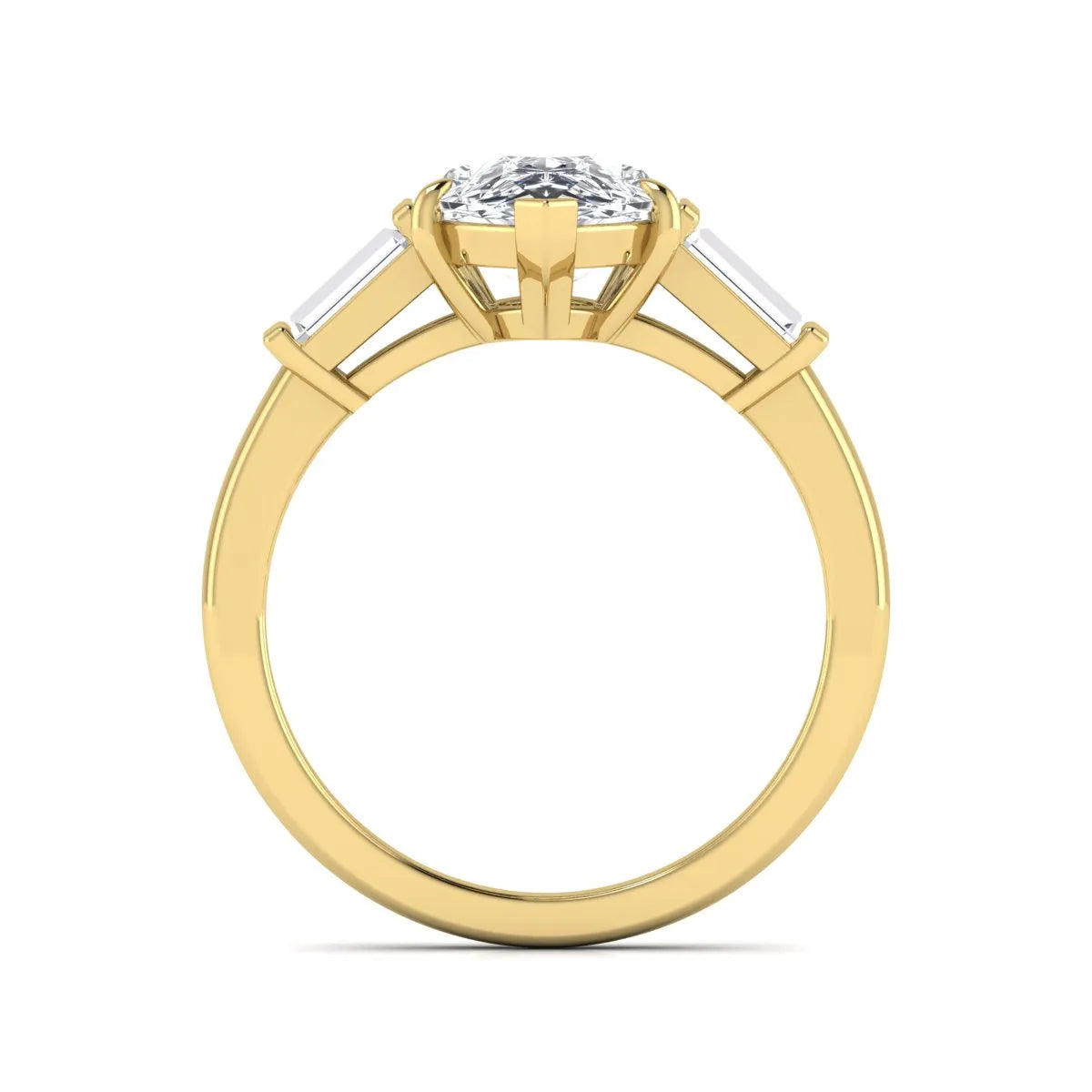 Pear cut lab grown diamond three stone engagement ring with baguette side diamonds in a classic prong setting in yellow gold